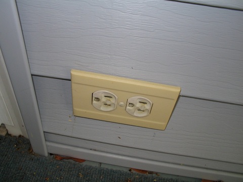 If you want an outlet outdoors, you MUST install a Ground Fault Circuit Interruptor (GFCI) and an in-use cover!